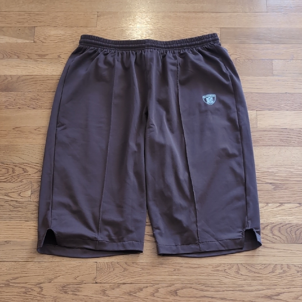 Like New Reebok XL Men's Dark Brown Athletic Shorts with Shield Logo. XL